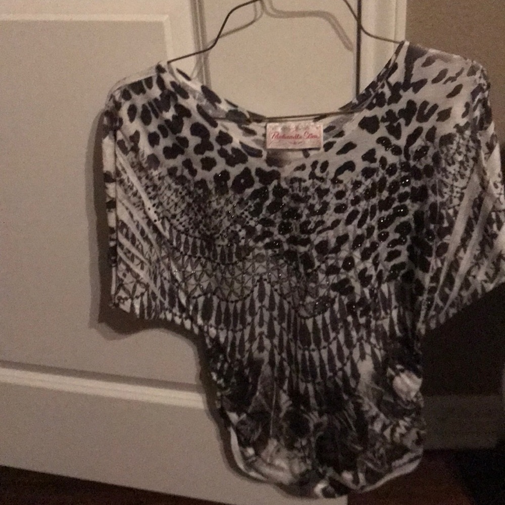 Black and white top with sparkling needs